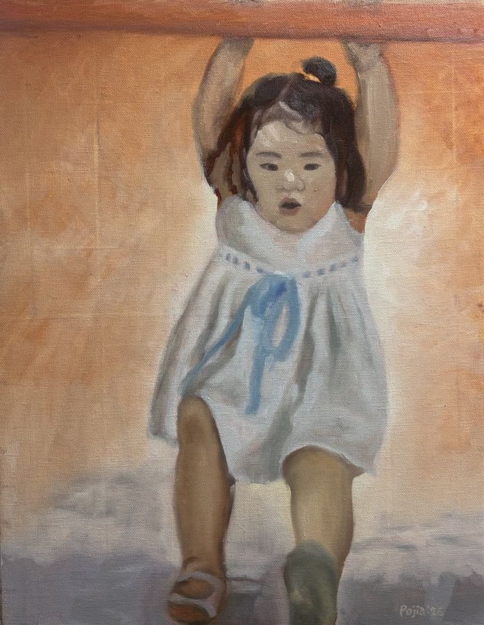 Reaching — a small child in a white dress with arms lifted against a warm glowing ground